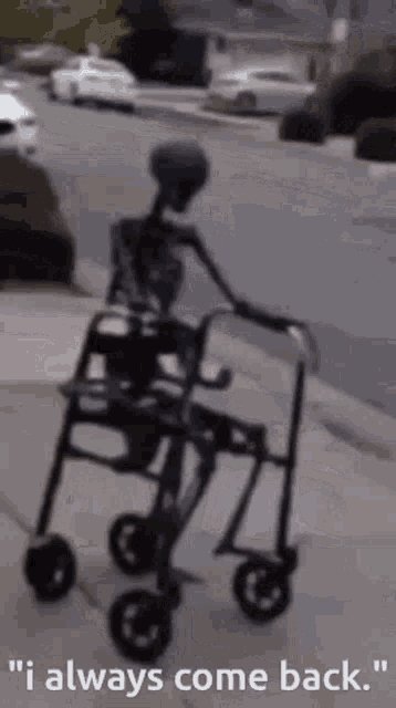 a gif of a skeleton in a wheel chair with the text 'i always come back' referencing william afton from five nights at freddys